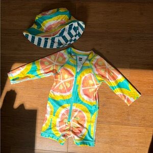 Tea Collection Citrus Splash Swimsuit and hat